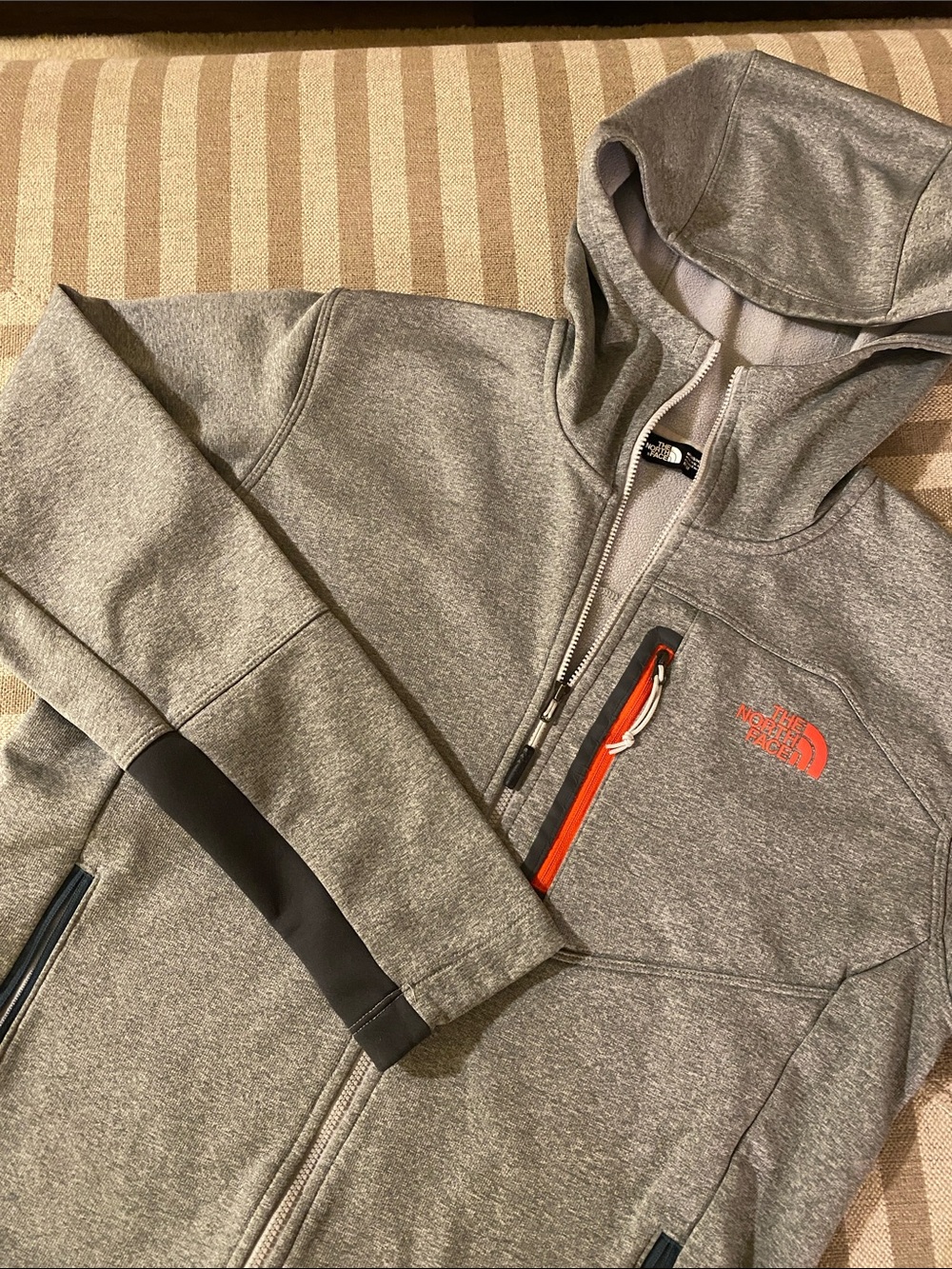 The North Face Men’s Gray Hooded Jacket with Orange Accent. Size M